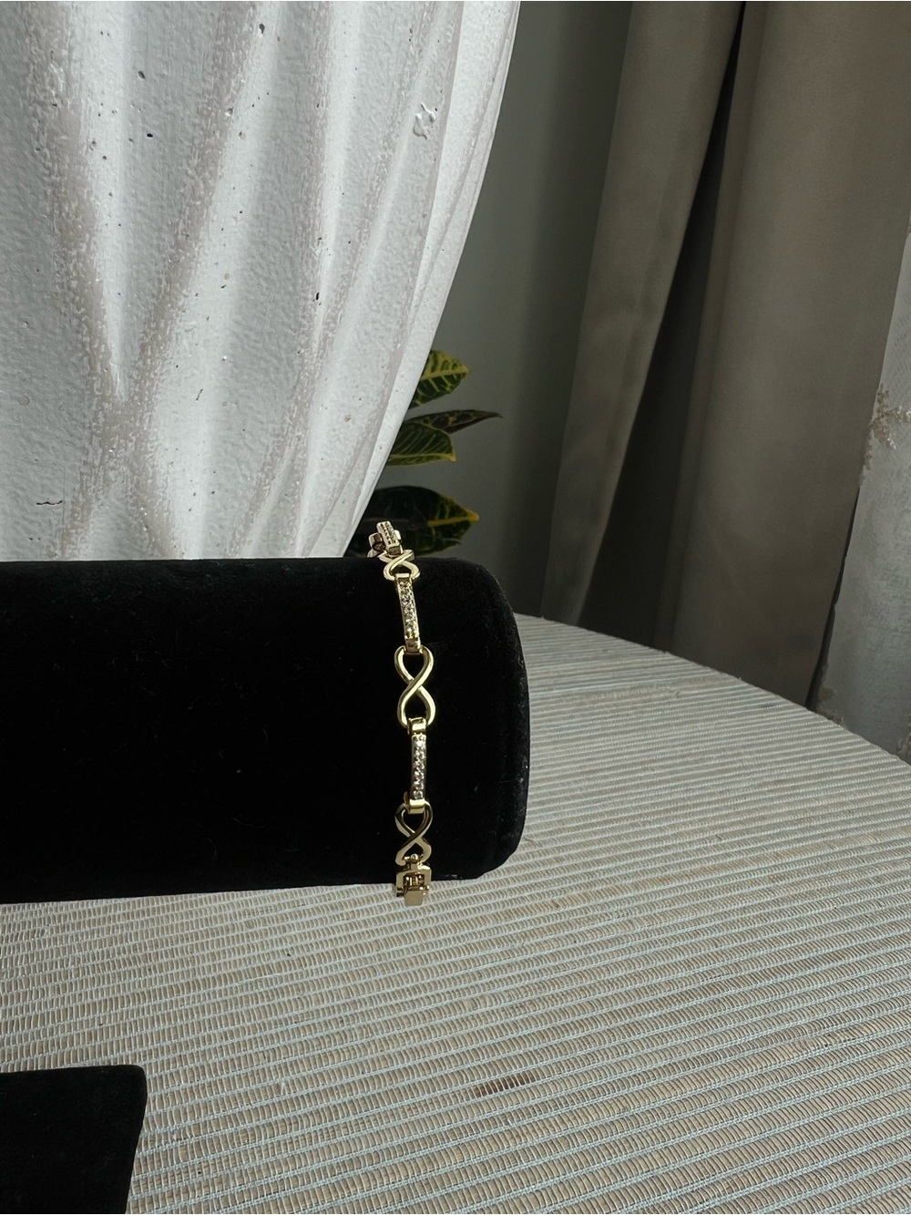 Gold Infinity Bracelet with Crystal Accents links